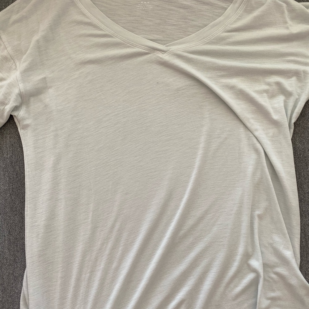 mint green v-neck shirt